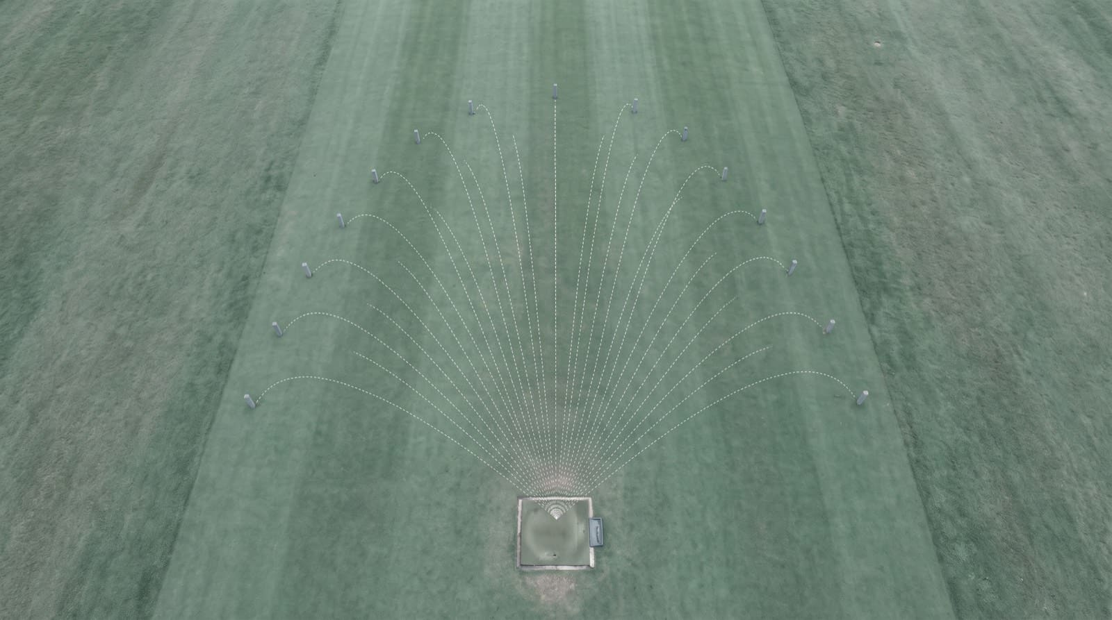 Overhead view of a practice range: a fan of dotted ball-flight arcs of stepping lengths radiating from a single tee, each arc ending at its own distance marker post, illustrating the yardage ladder of a full set of clubs.